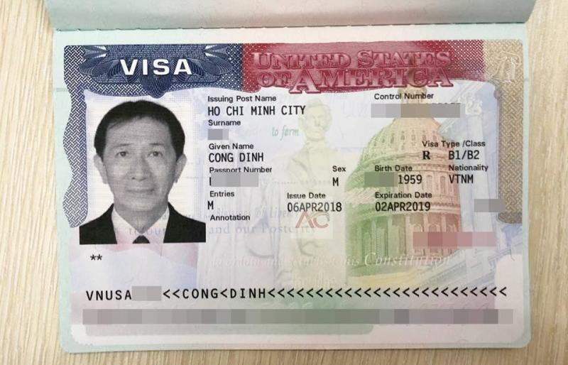 Trang thị thực Mỹ có ảnh một người đàn ông ở bên trái. Thông tin chi tiết bao gồm tên, loại thị thực B1/B2, ngày cấp 6 tháng 4 năm 2018 và ngày hết hạn 2 tháng 4 năm 2019.
