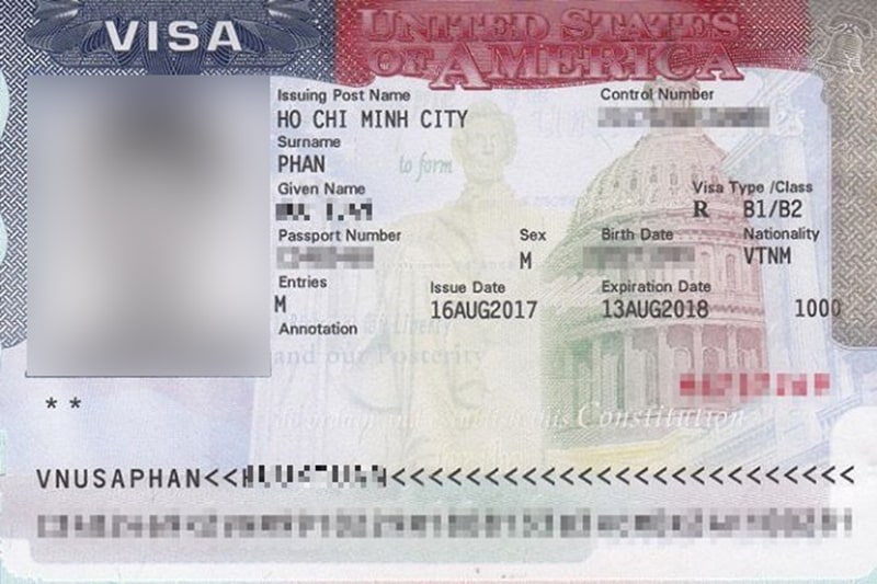 Visa du lịch Hoa Kỳ loại B1/B2 với ảnh chân dung và thông tin cá nhân đã được làm mờ