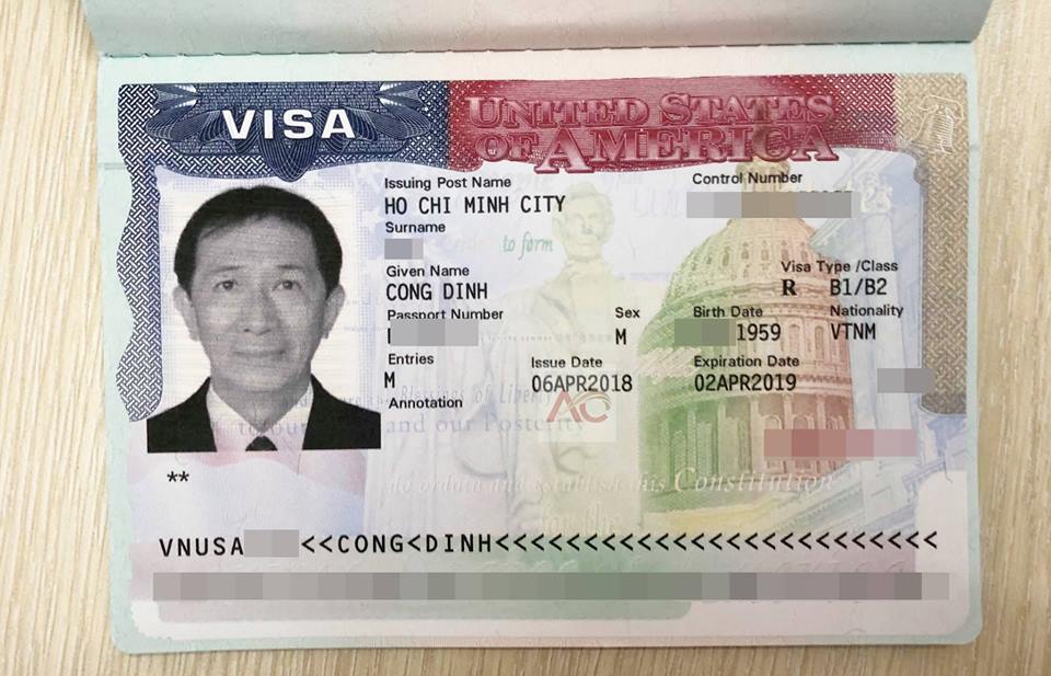 Trang thị thực Mỹ có ảnh một người đàn ông ở bên trái. Thông tin chi tiết bao gồm tên, loại thị thực B1/B2, ngày cấp 6 tháng 4 năm 2018 và ngày hết hạn 2 tháng 4 năm 2019.